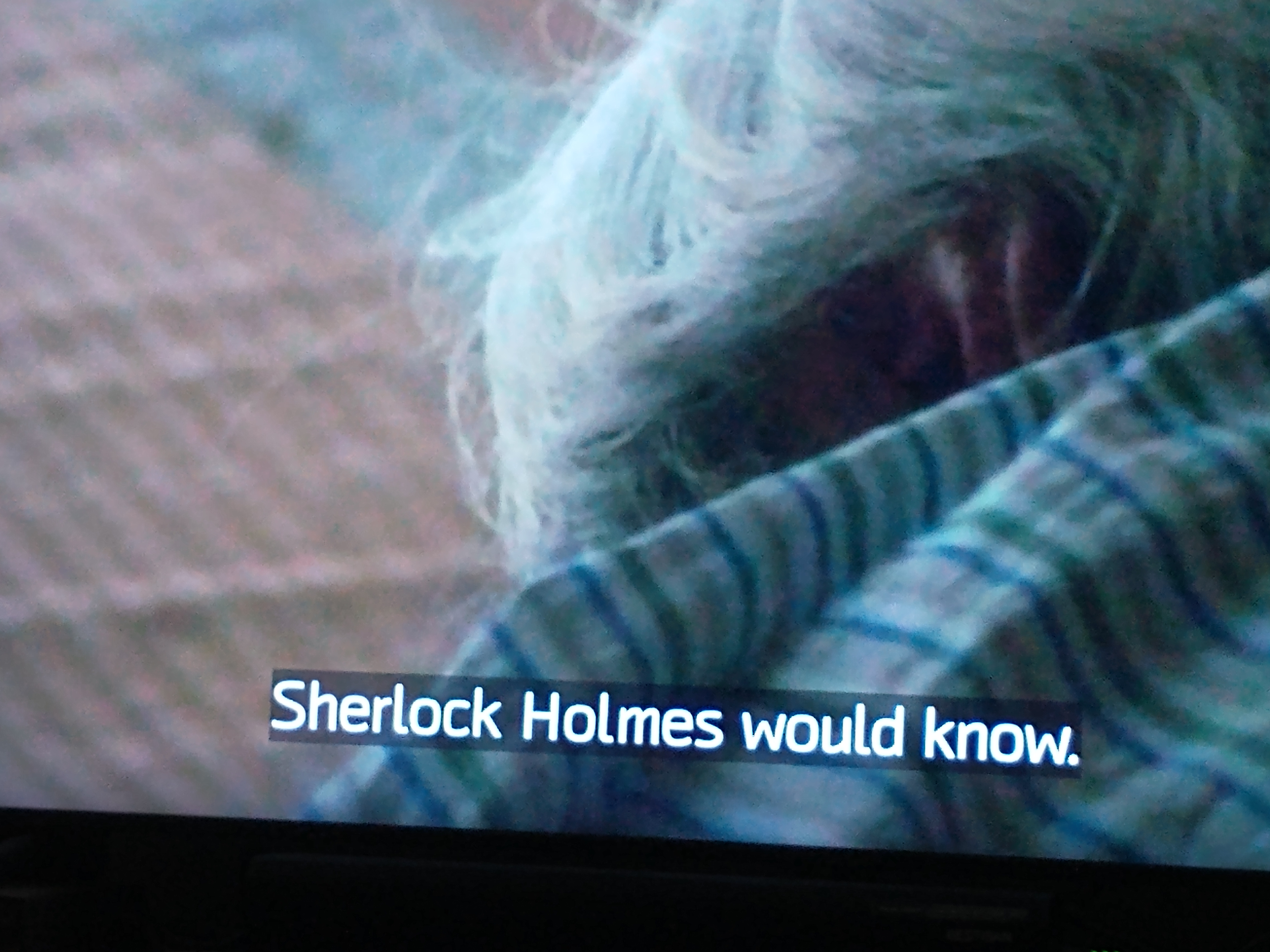 Back of white haired man with subtitle saying Sherlock Holmes would know