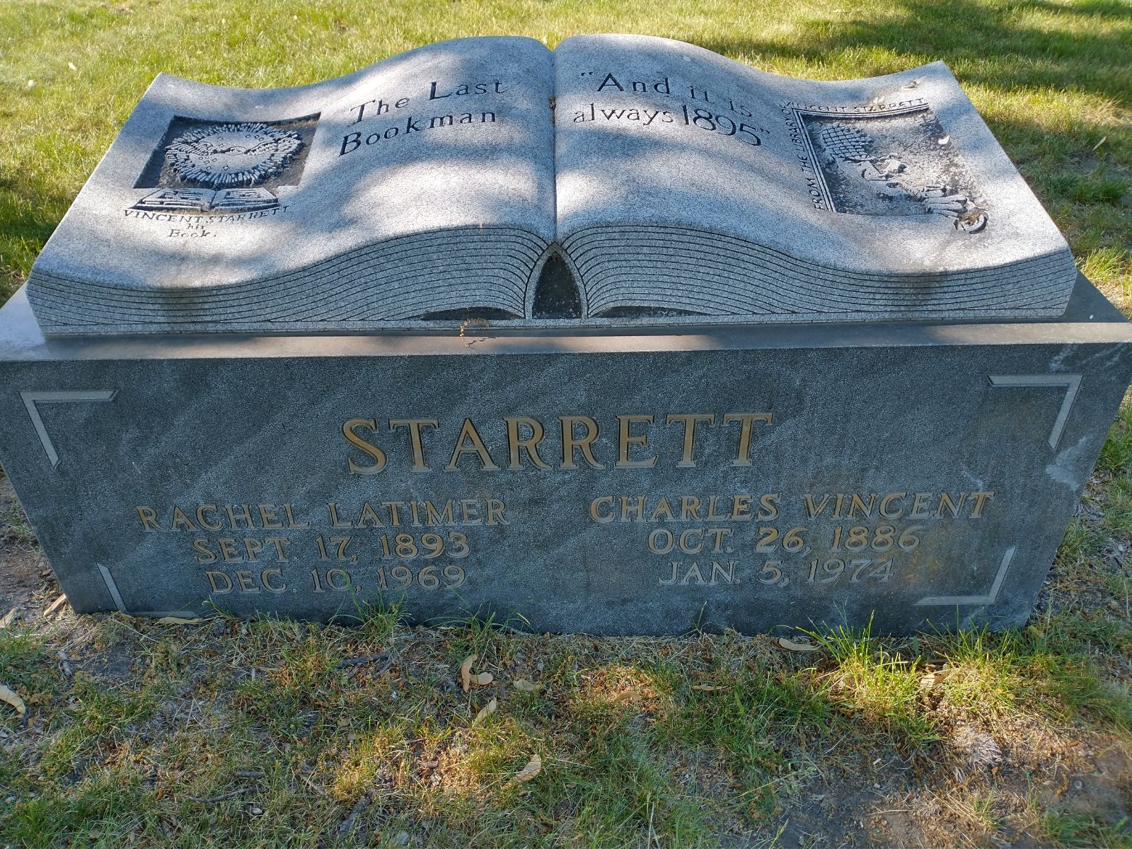 Huge headstone with Starrett on the front and a carved book on top.